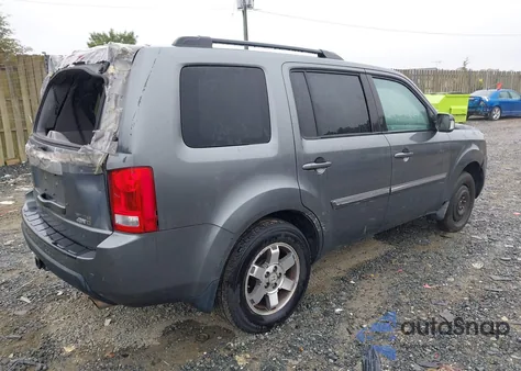 2011 Honda Pilot Touring z USA, uszkodzony, nr VIN 5FNYF4H92BB035672